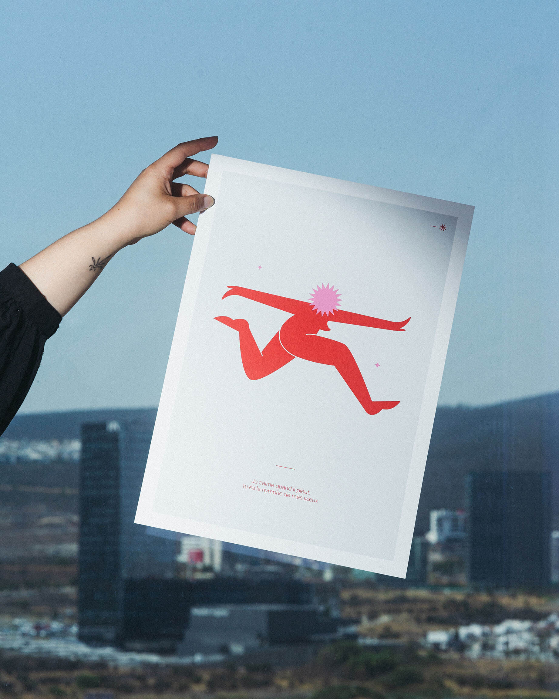 Image of a hand showing a poster